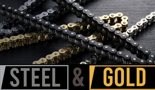 Collection of gold plated and steel motocross chains laid out: Steel & Gold: The Secrets of Motocross Chains